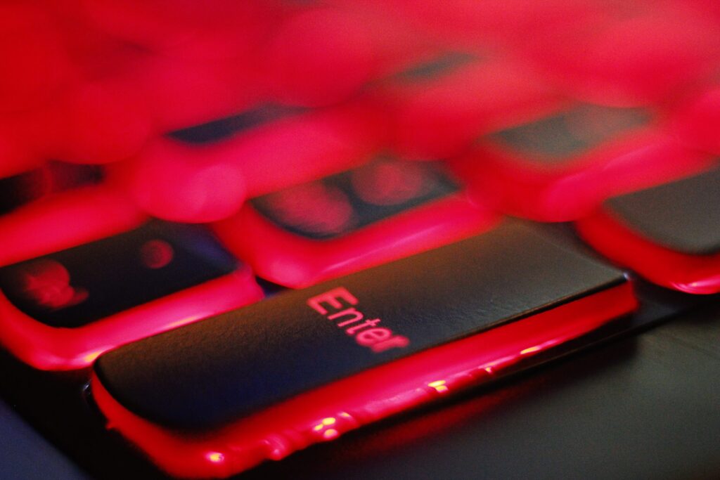 a close up of a red and black keyboard